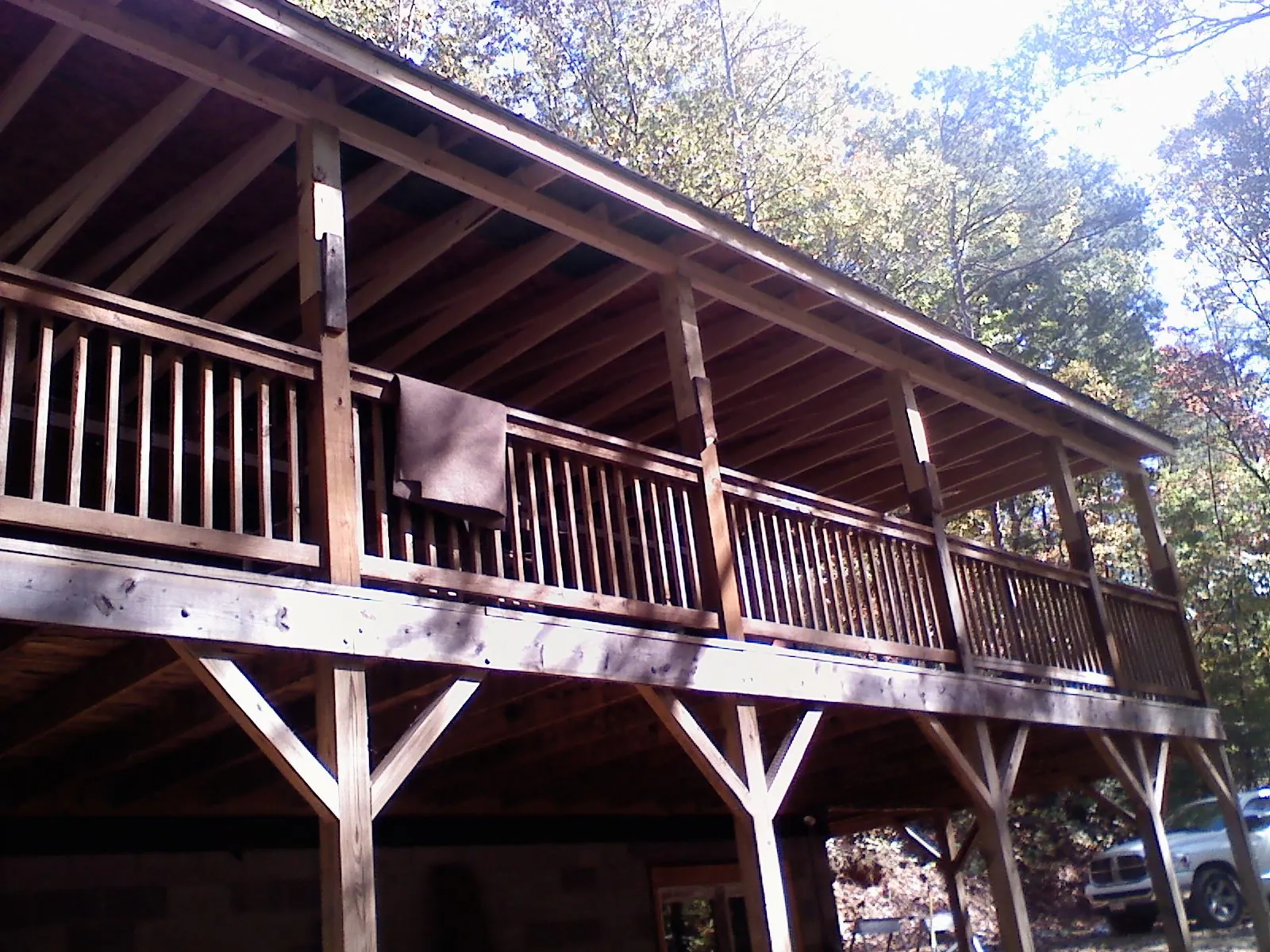 Timber framing under a new elevated porch and deck — Roof Leak Repair in Hasty by Roofing Brothers